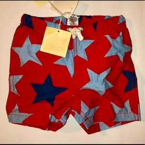 Baby Boden swim shorts 6-12 red blue stars